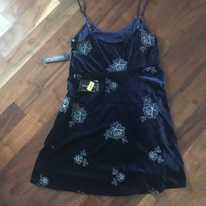 navy dress with a flower design